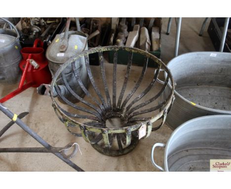 A wrought iron baluster planter, approx. 21½" dia. x 16" high