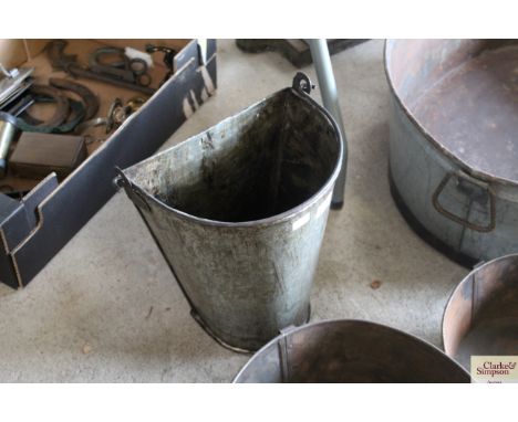 A bucket wall planter with swing handle