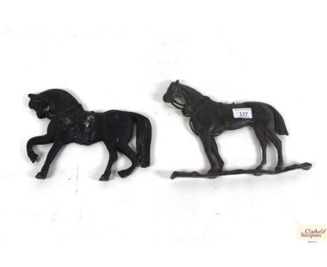 A lead horse mantelpiece ornament and another