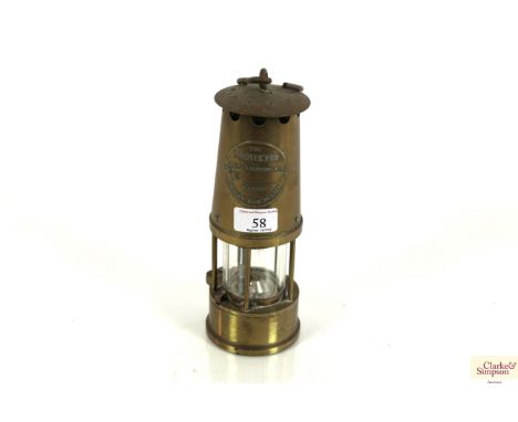 The Protector Lamp &amp; Lighting Co. Ltd of Eccles Manchester brass miners lamp