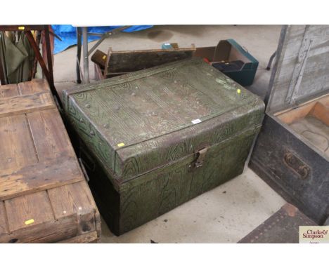 A japanned metal trunk