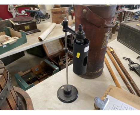 A cast iron base desk lamp
