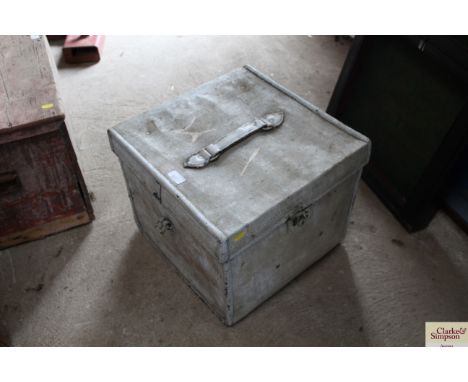 A vintage canvas and leather trunk