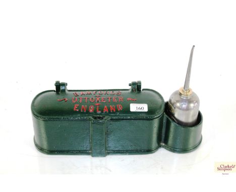 A Bamford cast iron toolbox with Braimes oil can Agricultural Engineers Chelmsford and some tools