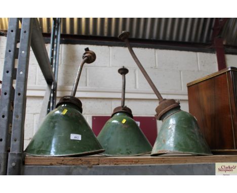 Three green enamel pendant lights