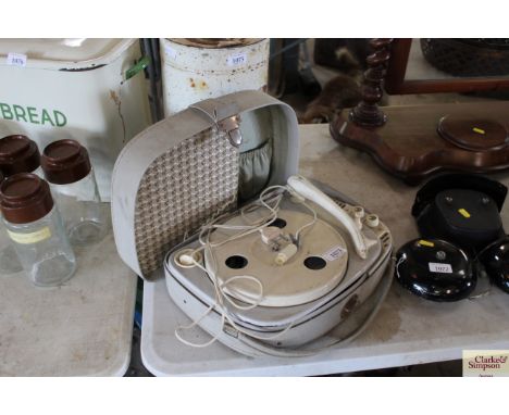 A portable record player  AF