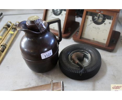 A Bakelite Thermos flask, an ash tray with rubber tyre surround and a pipe