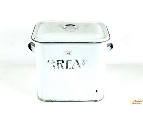 A vintage enamel bread bin