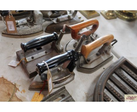 An I.C. Hawkins &amp; Co. of London Supreme electric iron, Adam Co. photograph mounting iron, with integral thermometer with 