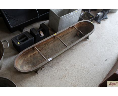 A cast iron Ransomes Sims &amp; Jefferies Ltd of Ipswich four division food trough, approx. 47" overall