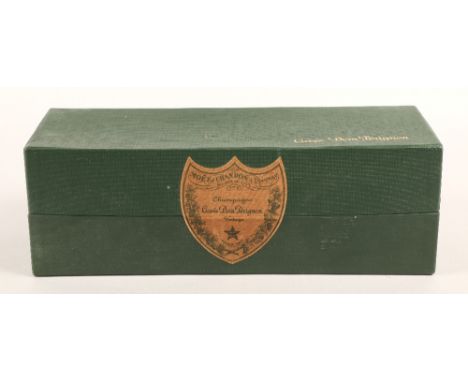 Dom Perignon champagne in sealed carton.The box remains sealed so unable to garner any further information beyond what is vis