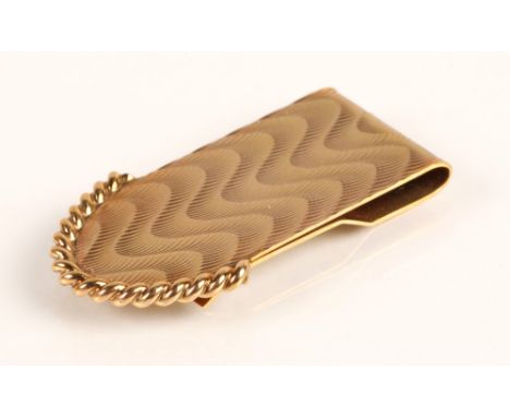9ct yellow gold money clip with engine turned decoration, weight 13.6gConditin report  Dimensions 4.8cmx 2.5cm x 0.4cm