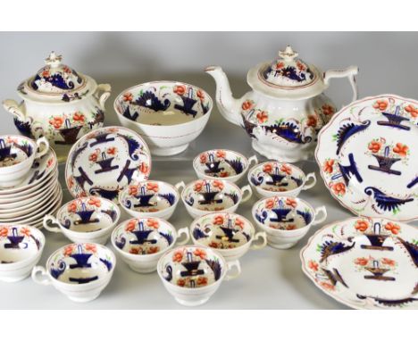 A GAUDY WELSH PART TEASET in lesser known 'Flower Basket' pattern comprising teapot, lidded sucrier, two tea-plates and cups 