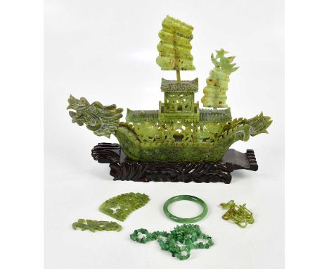 A Chinese hardstone model of a junk, the mast with gilt script, on hardwood plinth base, length 39cm, height 33cm, a Chinese 