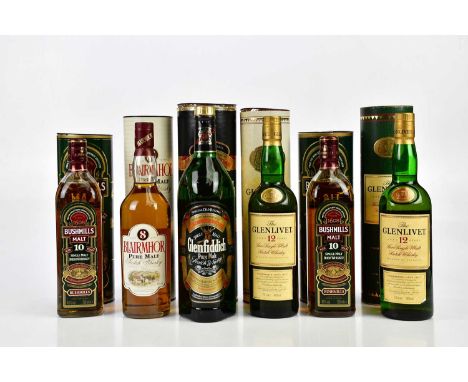 WHISKY; four bottles including two bottles of Glenlivet aged 12 years, Fine Single Malt Scotch whisky, 40%. 70cl, a bottle of
