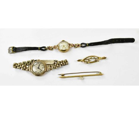 A 15ct yellow gold pearl set bar brooch, a Victorian yellow metal seed pearl bar brooch, a lady's 9ct gold cased wristwatch w