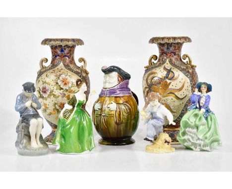 A pair of Japanese Satsuma twin handled pedestal vases decorated with stylised peacocks and floral decoration, height 30cm, a