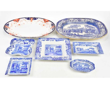A Victorian blue and white meat plate decorated with a river scene, length 45cm, a further meat plate and five pieces of Spod