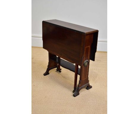 An Edwardian inlaid mahogany drop-leaf Sutherland table, with applied roundels in the manner of Wedgwood with classical figur