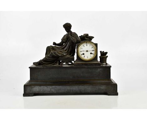 A Victorian figural mantel clock representing a bronzed figure of Grecian male beside the drum faced clock, the dial set with