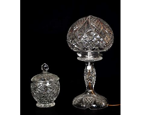 A cut glass lamp and shade, together with a cut glass jar and cover, height 40cm.Condition Report: The item or items in this 