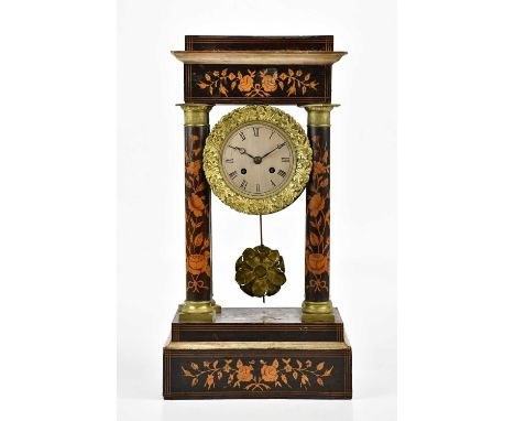 A 19th century French inlaid portico clock, with silvered dial set with Roman numerals, height 46cm.