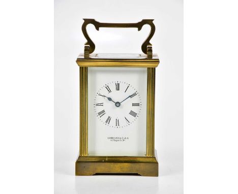 GARRARD &amp; CO LTD; a brass cased carriage clock, the white dial set with Roman numerals and inscribed ‘Garrard &amp; Co Lt