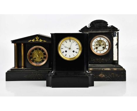 A Victorian slate mantel clock of architectural form with gilt metal columns, flanking the dial set with Roman numerals, heig