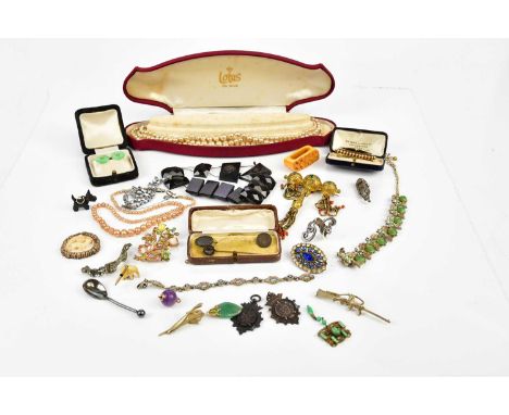 A small collection of costume jewellery to include a faux pearl necklace, bracelets, jade cufflinks, etc.