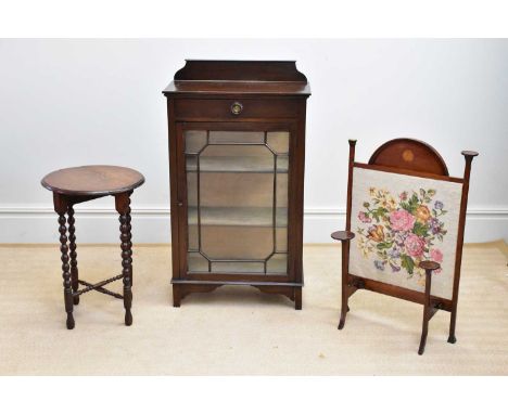 An Edwardian mahogany cabinet with raised back above a single drawer and astragal glazed door, width 61cm, and Edwardian fire