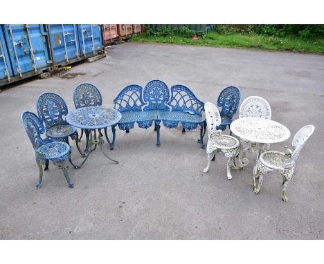 A blue painted aluminium garden table and four chairs, together with a blue painted iron three seater bench and a white paint