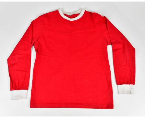 GEORGE BEST; a Manchester United 1960s retro style signed football shirt, signed to the reverse.Condition Report: Creasing an