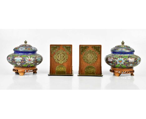 A pair of late 20th century Chinese cloisonné vases and covers, decorated throughout with flowers against a silver coloured g