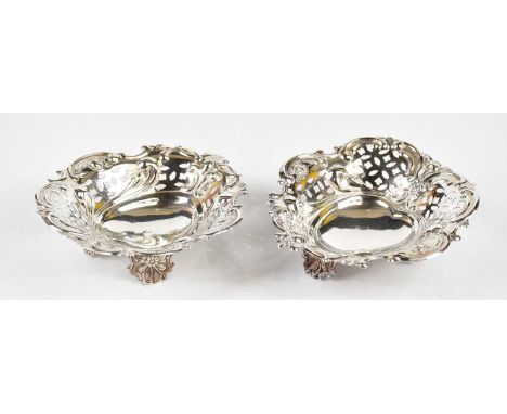 WILLIAM HUTTON &amp; SONS; a pair of Edward VII hallmarked silver heart shaped bonbon dishes with pierced decoration, London 
