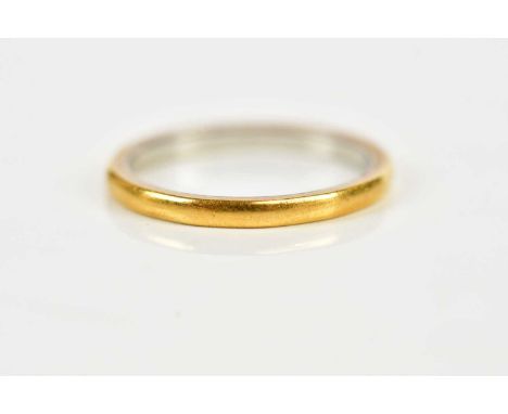 A 22ct yellow gold wedding band, size K, approx 2.7g.