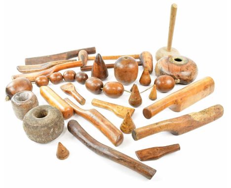 A collection of boxwood and lignum vitae vintage lead worker's tools.