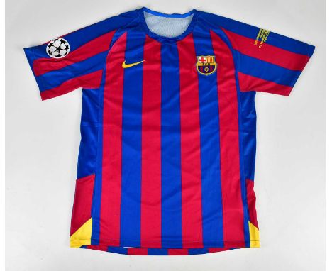 RONALDINHO; a signed Barcelona retro style football shirt, signed to the reverse, size XL.Condition Report: Creasing and ligh