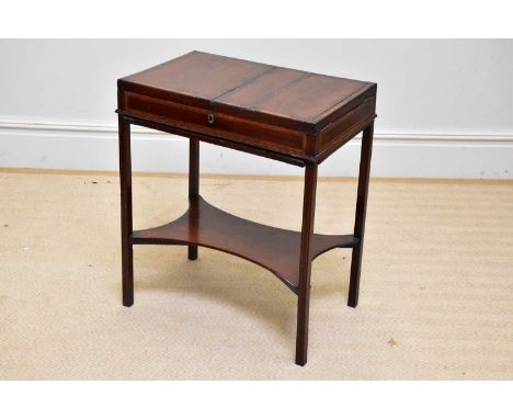 A Georgian inlaid mahogany gentleman's washstand/night table, the hinged covers enclosing mirror and compartments, on block l