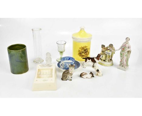 A small group of ceramics to include a Royal Worcester bulldog, a Royal Doulton cat, a Continental figure of a maiden, a blue