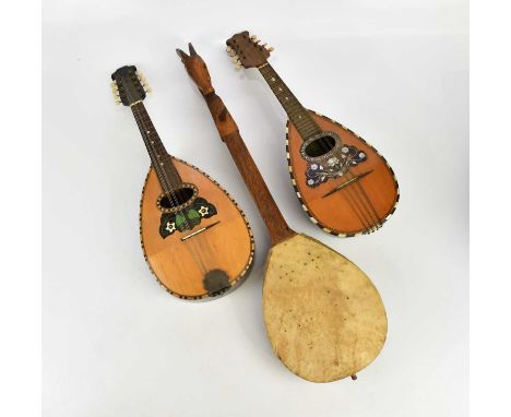 LUIGI POPPI, PALERMO; a bowl back mandolin, a flat back mandolin and an ethnic instrument (3).