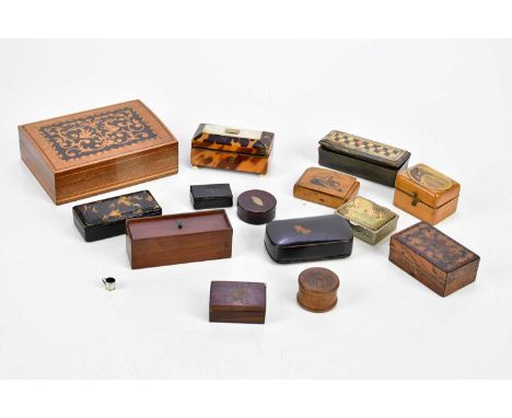 A collection of early 19th century and later snuff boxes including a Georgian papier-mâché example, horn examples, a tortoise