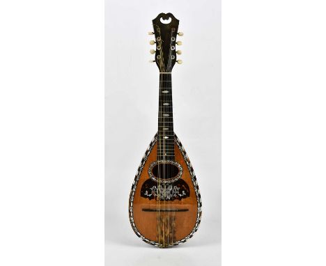 A 19th century rosewood bowl back Italian mandolin, bears label to the inside 'Ferrari &amp; Co'.Condition Report: There is a
