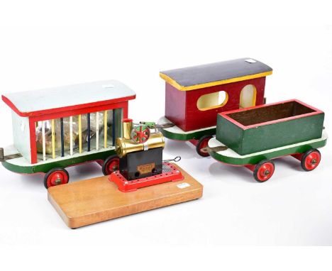 MAMOD; a boxed T.E.1a steam tractor, MAMOD engine mounted on plinth base and a wooden train.
