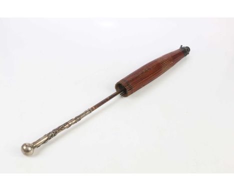 A Chinese sterling silver handled parasol with bamboo cane, the silver mount decorated with a dragon, length 72cm.
