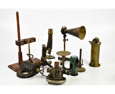 A collection of early 20th century scientific instruments to include a lacquered brass and cast iron cone with label Griffith