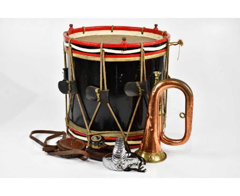 A military regimental drum, height 37cm, a copper military horn, two leather cased compasses and single epaulette.