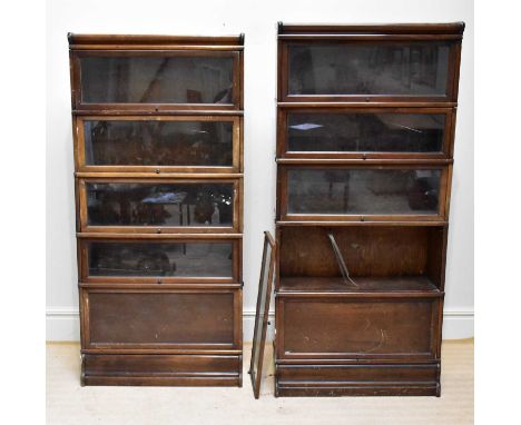 GLOBE WERNICKE; two metal bound five tier stacking bookcases with up and over doors, height of largest example 185cm (in need