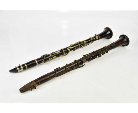 JTL, LONDON; a class 'C' B flat clarinet, with black leather case, also a rosewood clarinet with various stamps including 'A 