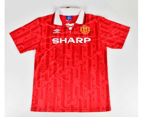 ERIC CANTONA; a 92/97 Manchester United retro style football shirt, signed to the reverse, size L.Condition Report: Creasing 