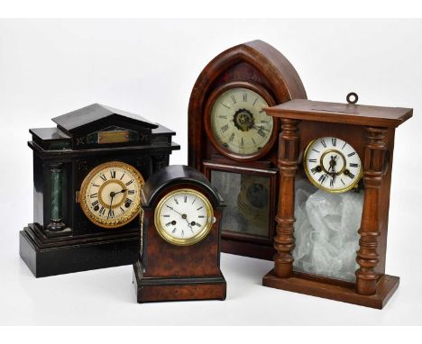 An American lancet shaped wall clock, with glass door and internal printed label, height 46cm, and three other clocks (4)